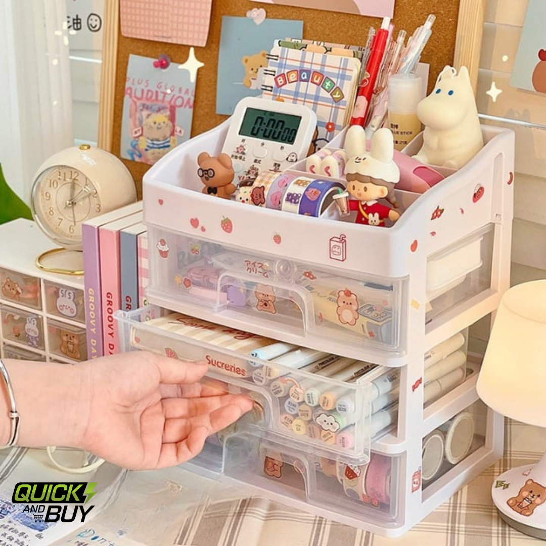 Desk organizer with stationery items and a hand reaching for a pen.