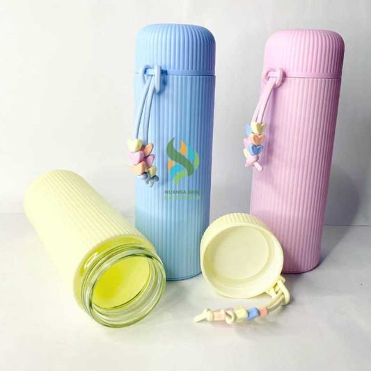 Stylish 400ml Glass Water Bottle 
Elegant Design with Protective Plastic Shell and a Charming Beaded Silicone Strip with beats on the Cap
